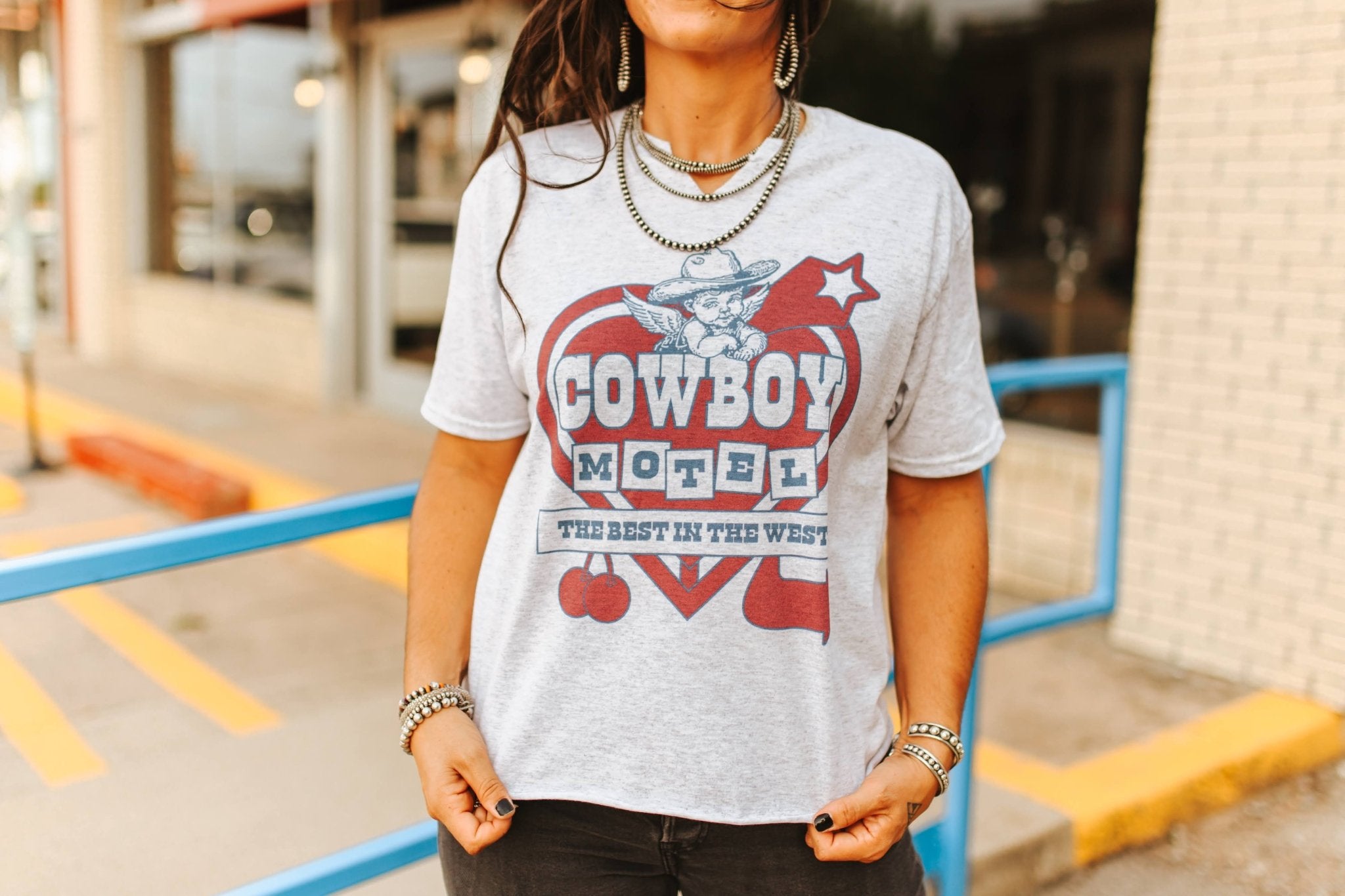 Cowboy Motel Raw Cut V - neck Graphic TeeLight AshXS
