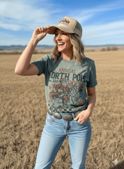 Reindeer North Pole Rodeo Graphic TeeHeather Military GreenS