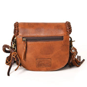 Turquoise Accent Braided Leather Fringe Crossbody Bag