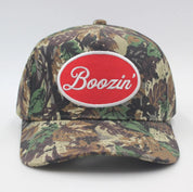 Boozin' Embroidered Tree Camo Trucker Hat