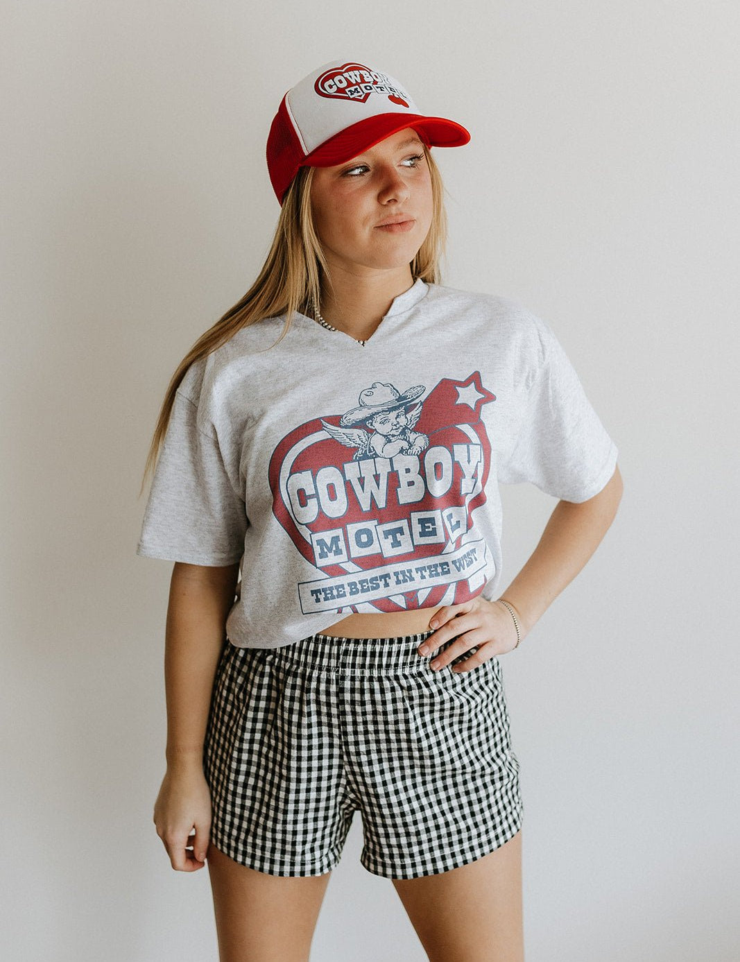 Cowboy Motel Raw Cut V - neck GraphicTeeAdd tee color hereS