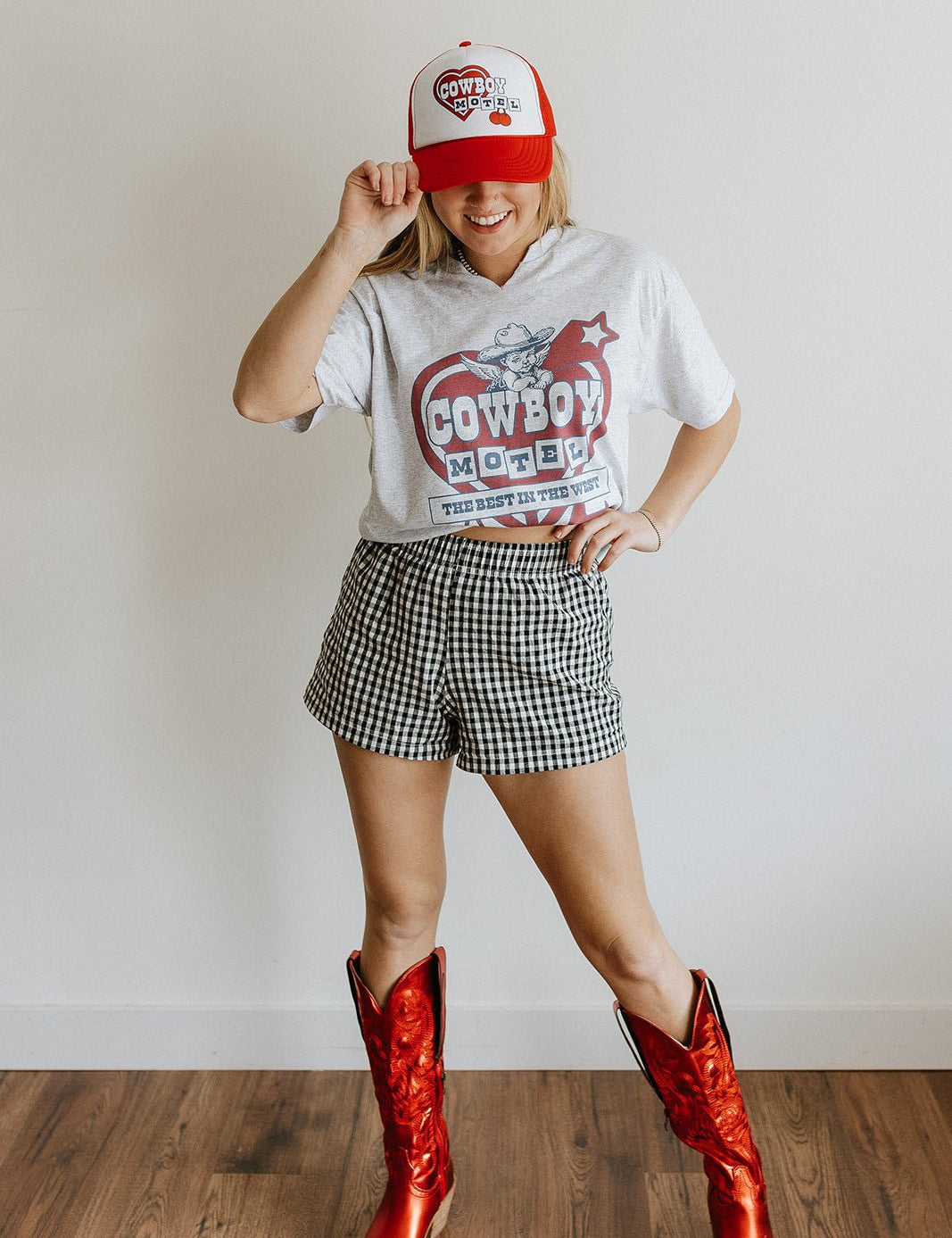 Cowboy Motel Raw Cut V - neck GraphicTeeAdd tee color hereS