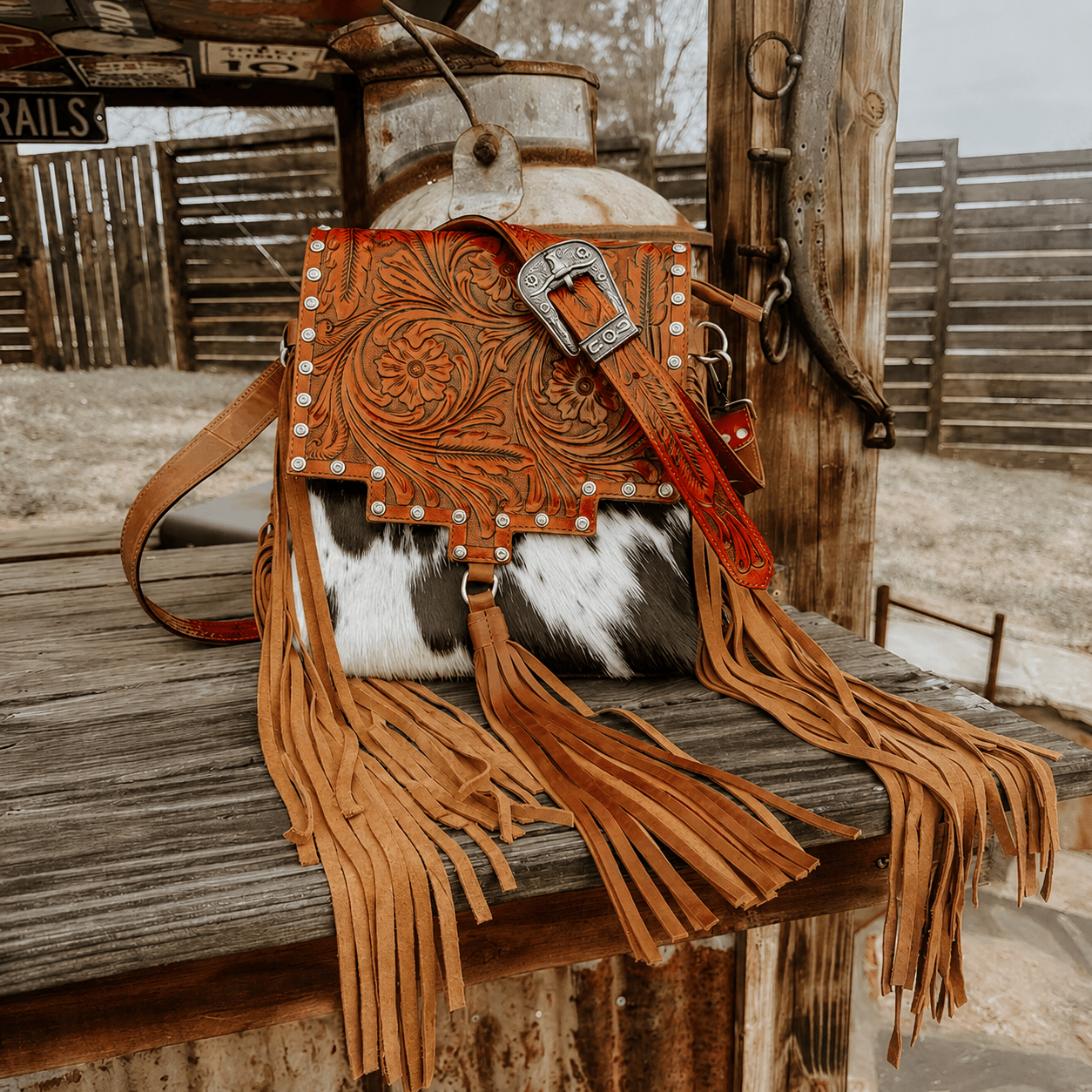 Cowhide Tooled Leather Fringe Crossbody Bag