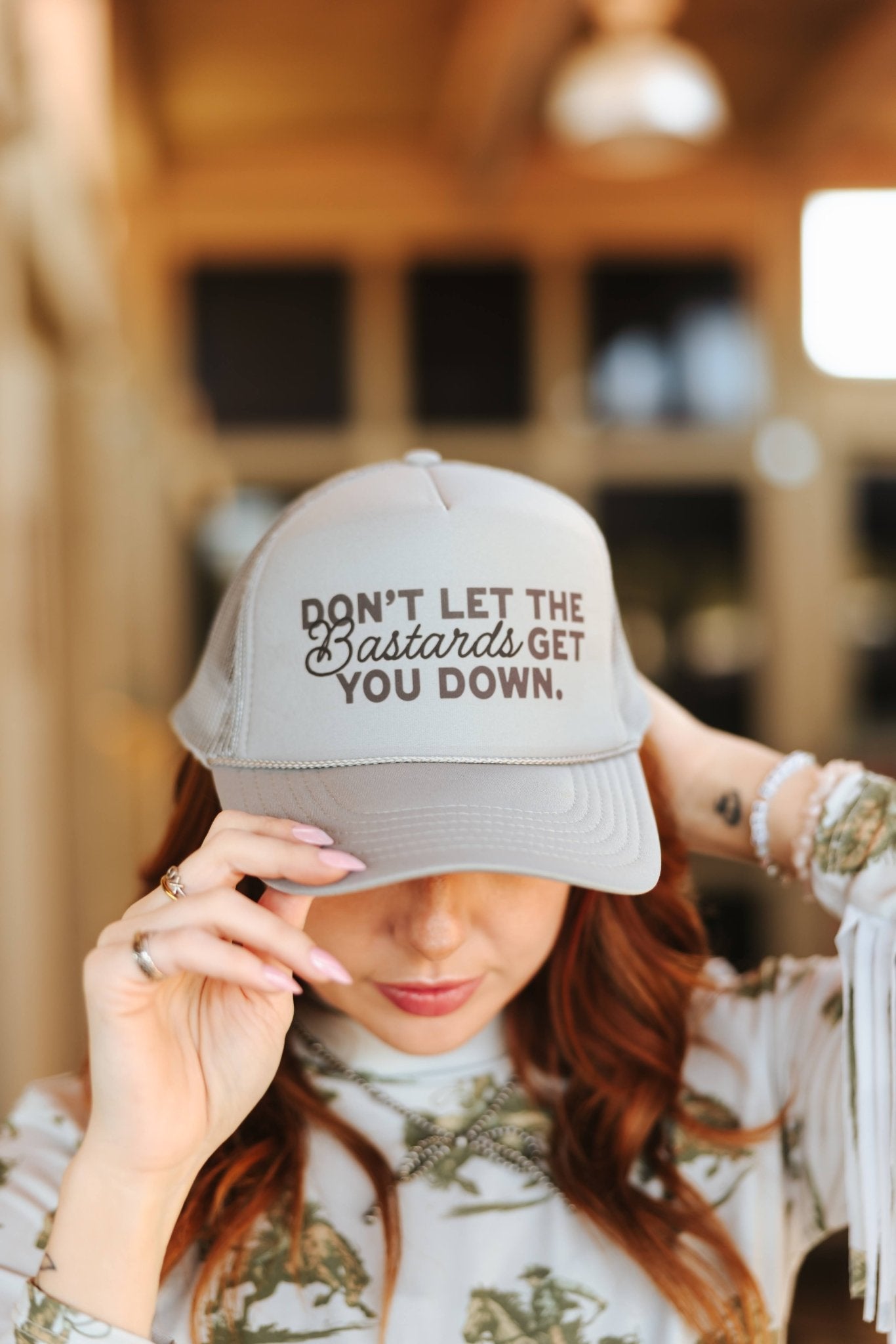 Don&#39;t Let Bastards Get You Down Trucker HatGrey