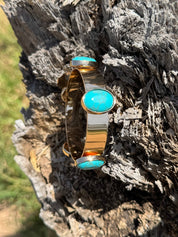 Gold Bangle with Turquoise Stones