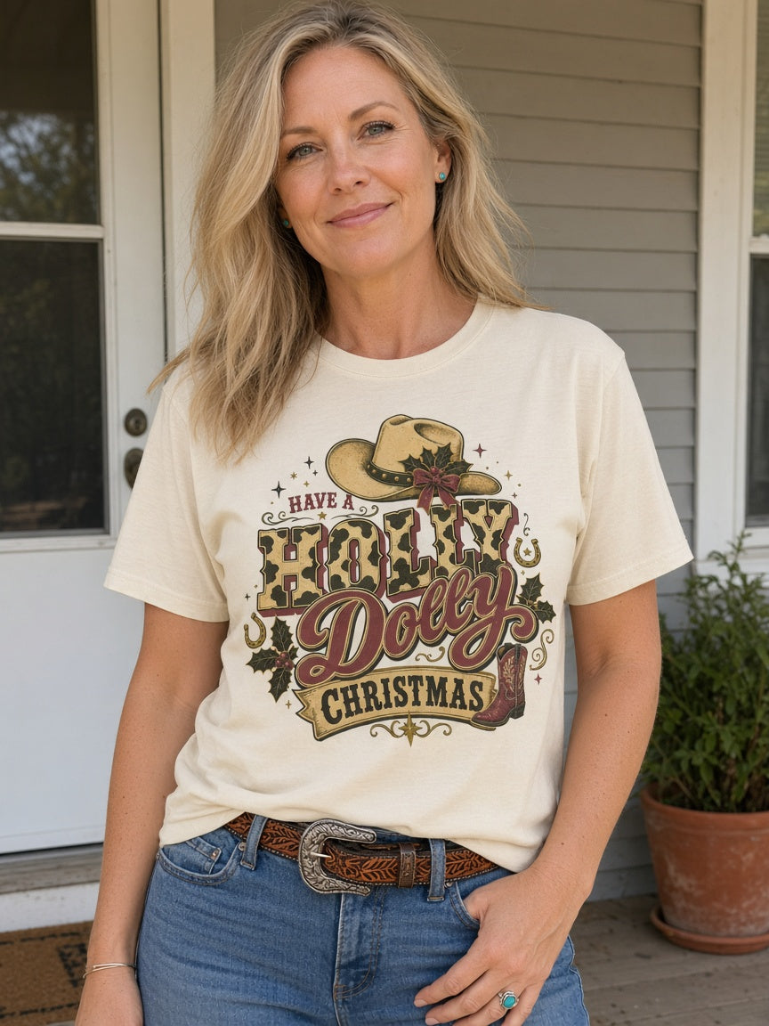 Model wearing Have A Holly Dolly Christmas Graphic Tee on a front porch