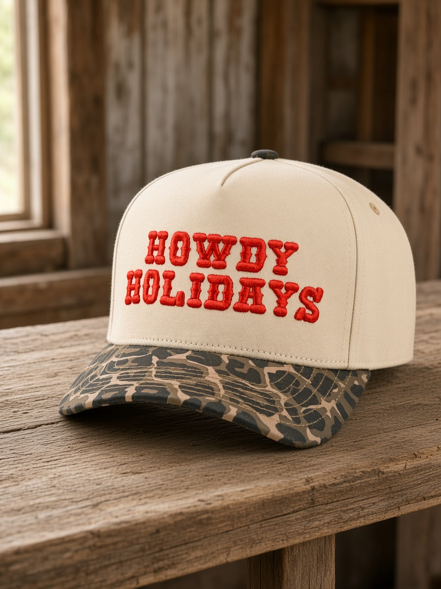 Howdy Holidays Christmas embroidered leopard brim trucker hat on rustic wood