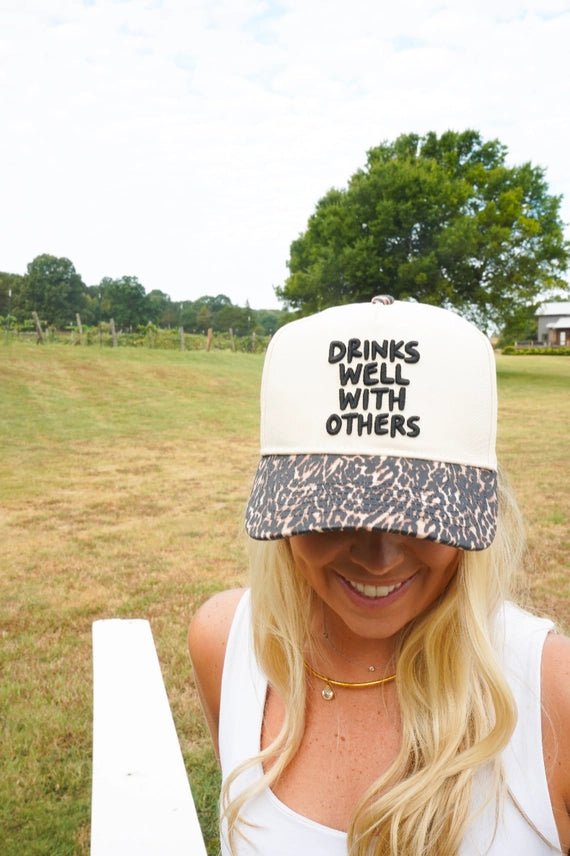 Leopard Drinks Well With Others Embroidered Trucker Hat