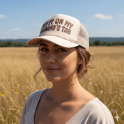 Put It On My Husband's Tab Trucker Hat