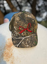 Red Bow Embroidered Tree Camo Trucker Hat