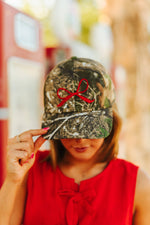 Red Bow Embroidered Tree Camo Trucker Hat