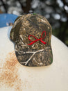 Red Bow Embroidered Tree Camo Trucker Hat