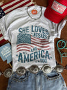 She Loves Jesus & America Graphic TeeAdd tee color hereS