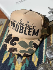 Somebody's Problem Camo Trucker HatCamo & Tan