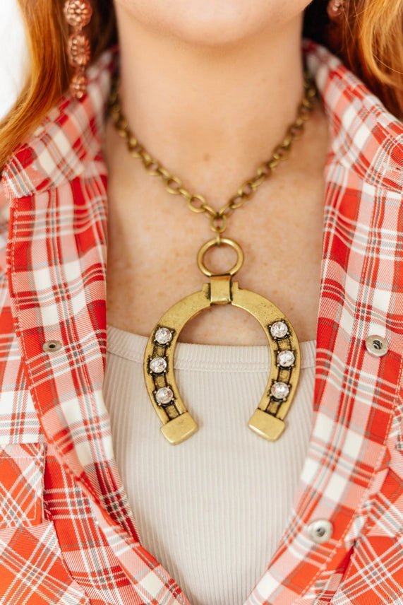 The Gilded Luck Horseshoe Pendant