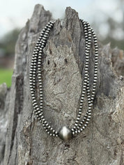 The Mesa Orb Triple Strand Beaded Necklace