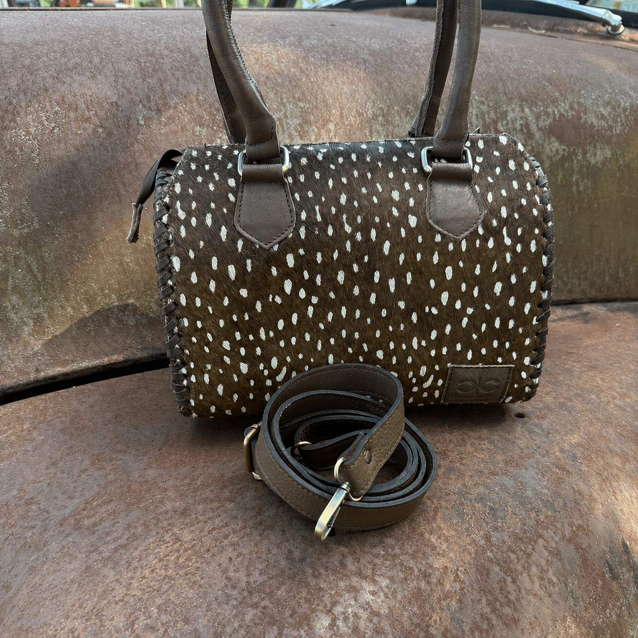 Wild Axis Spotted Cowhide Leather Handbag