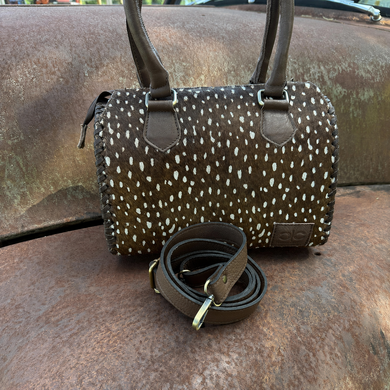Wild Axis Spotted Cowhide Leather Handbag