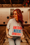 America Needs Cowgirls TeeWhiteS