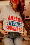 America Needs Cowgirls TeeWhiteS